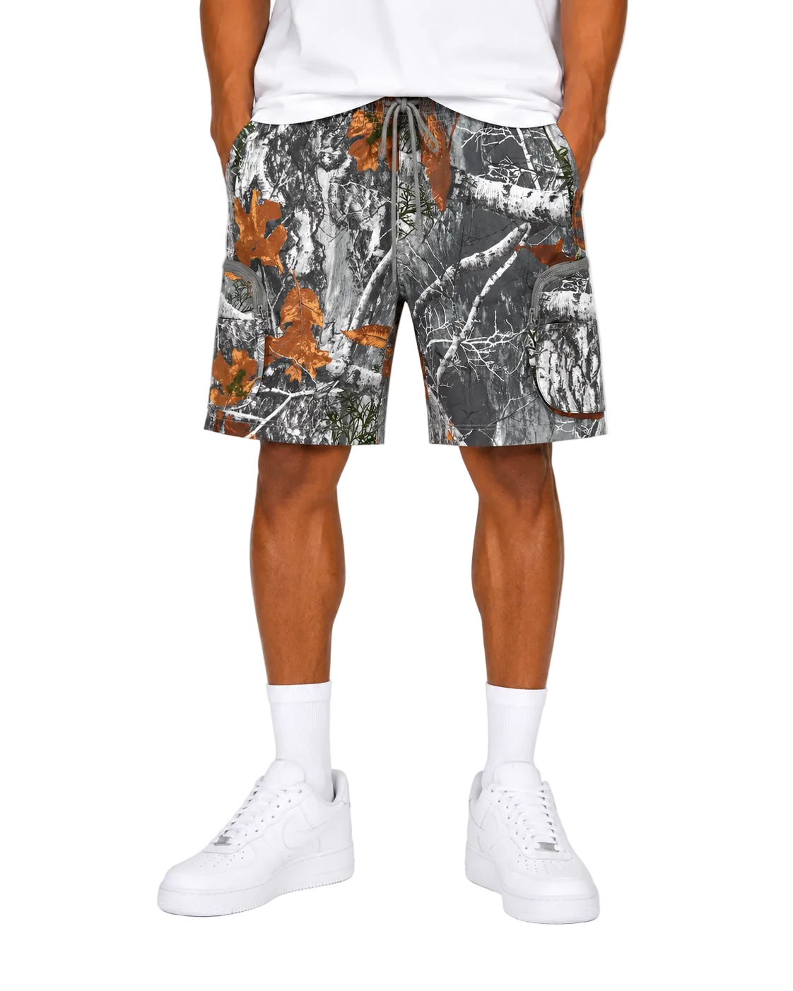 Person wearing camouflage shorts on a white background