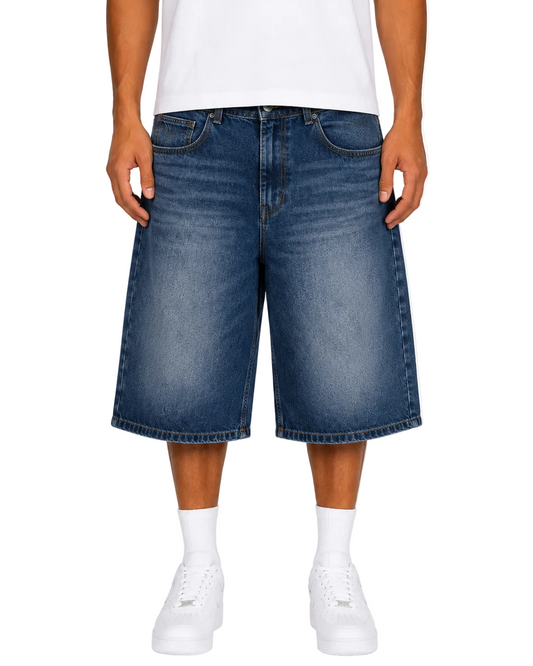 Person wearing blue denim shorts on a white background