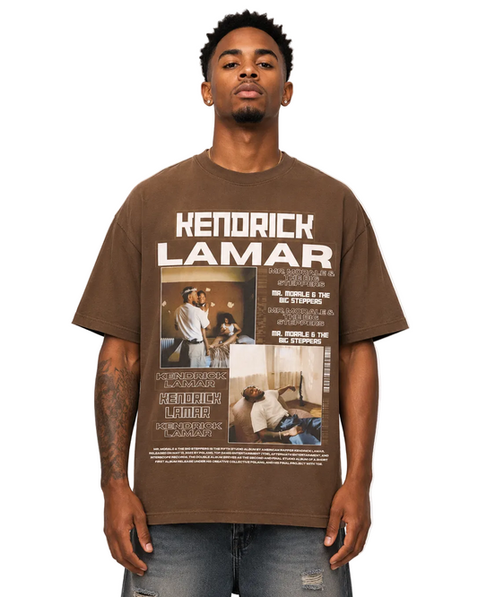 Man wearing a brown t-shirt with 'Hendrick Lamar' design on a plain background